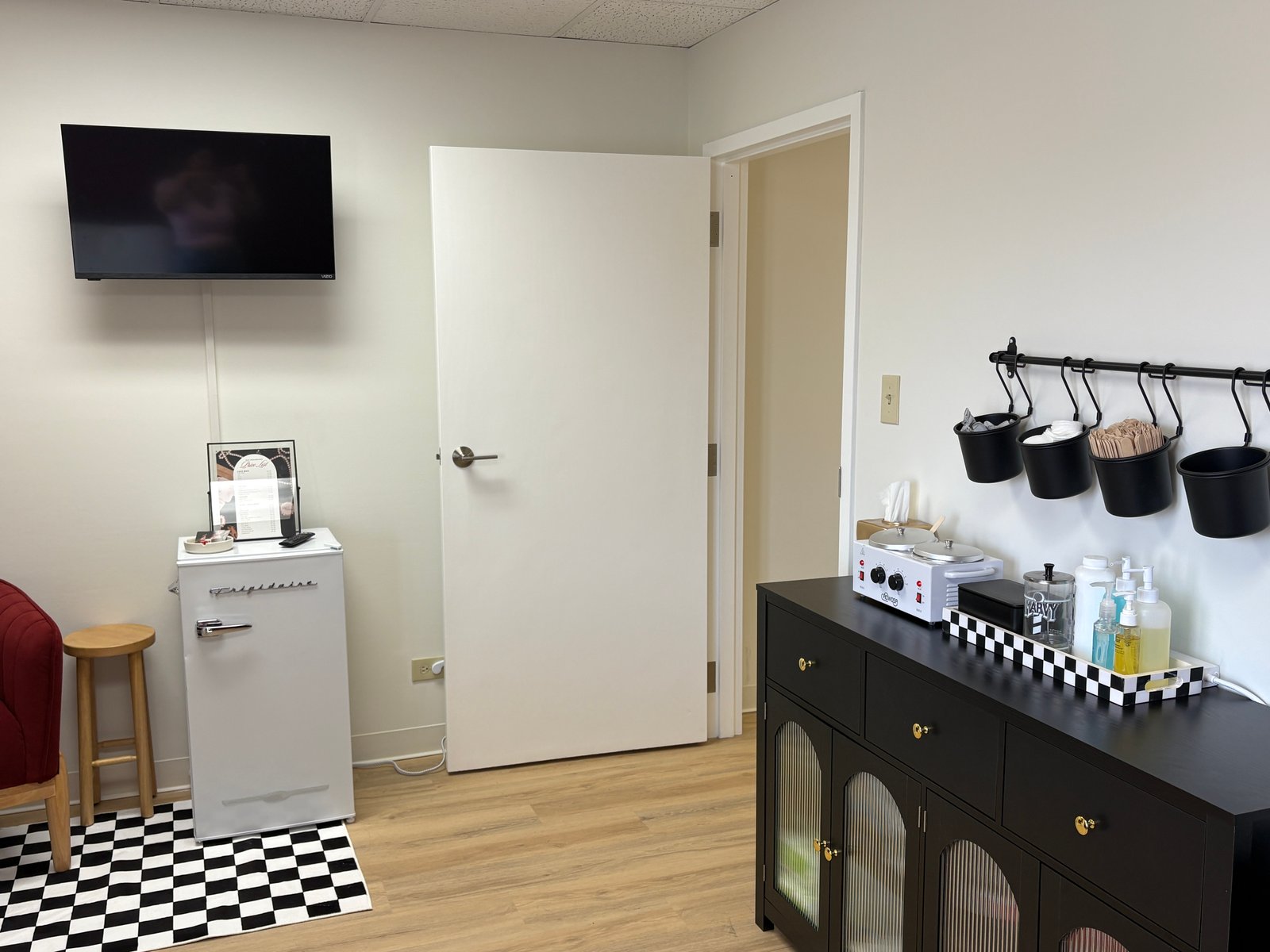 Clean waxing studio room with professional setup at Wax Regardless in Naperville, IL